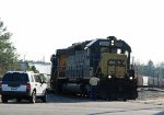 CSX 8488 leads a grain train onto the AC&W line